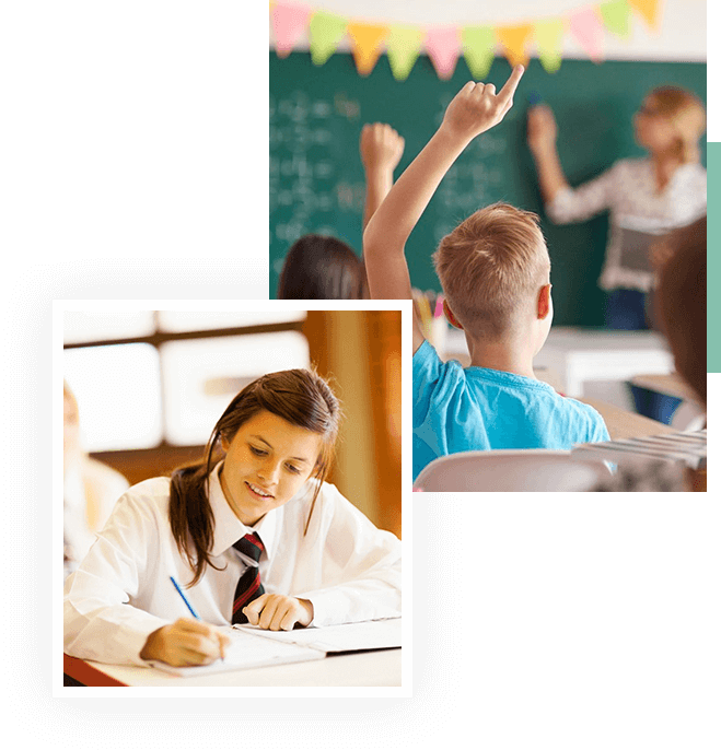 A picture of two students in class and one student is writing.